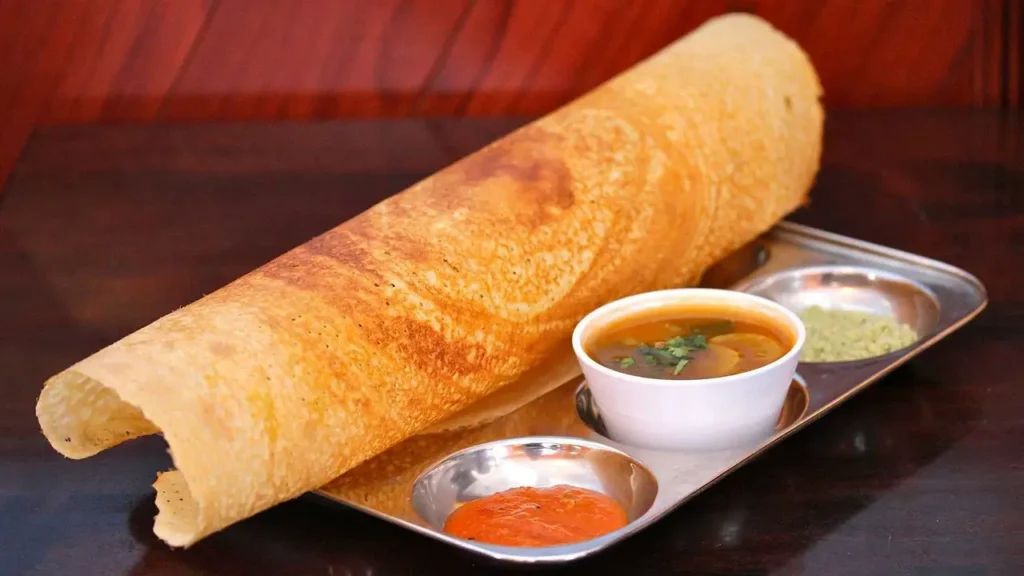 Masala Dosa Rolls filled with spicy potato mix, a creative take on traditional vegetarian street food.