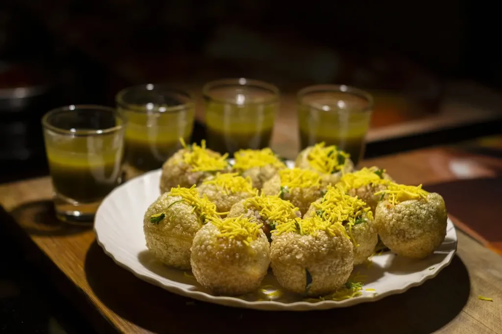 Sweet & Spicy Pani Puri showcasing crisp puris with tangy and flavorful fillings, a street food favorite.