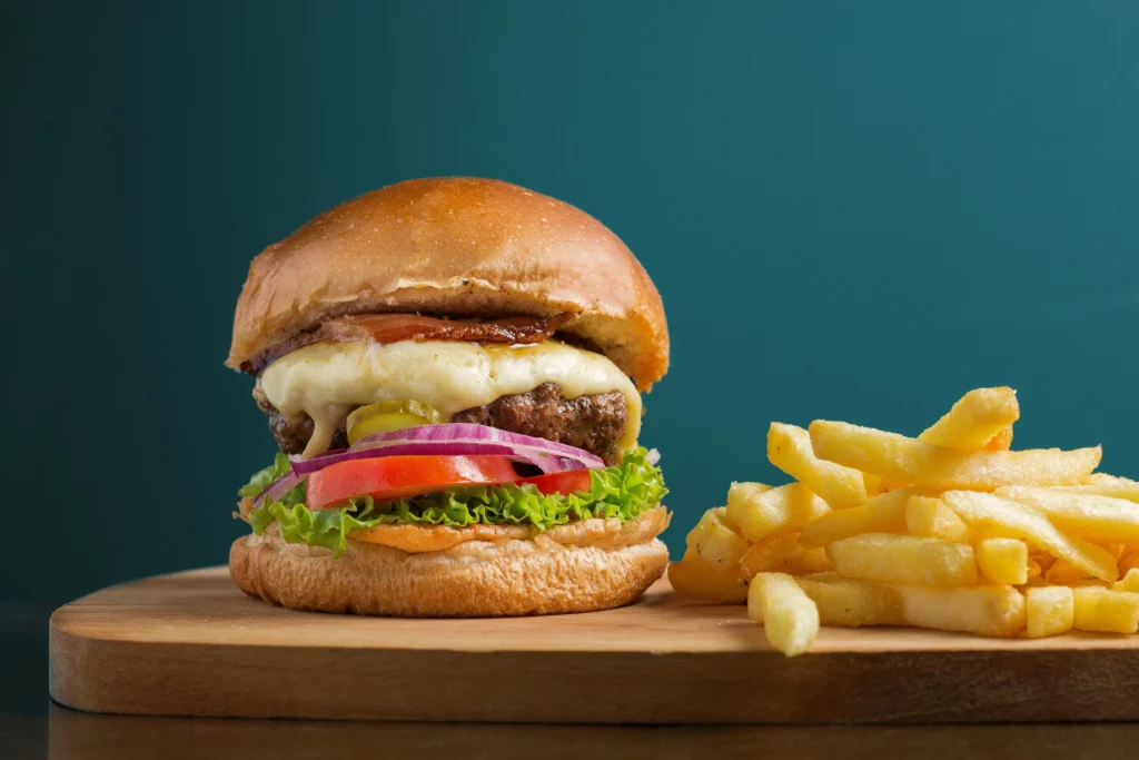 Tangy Aloo Tikki Burger with spiced mashed potatoes and crisp veggies, a modern twist on vegetarian street food.